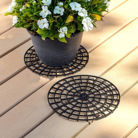 MISTIC COOL patio deck protector set of 2 elevates pots to protect surfaces.