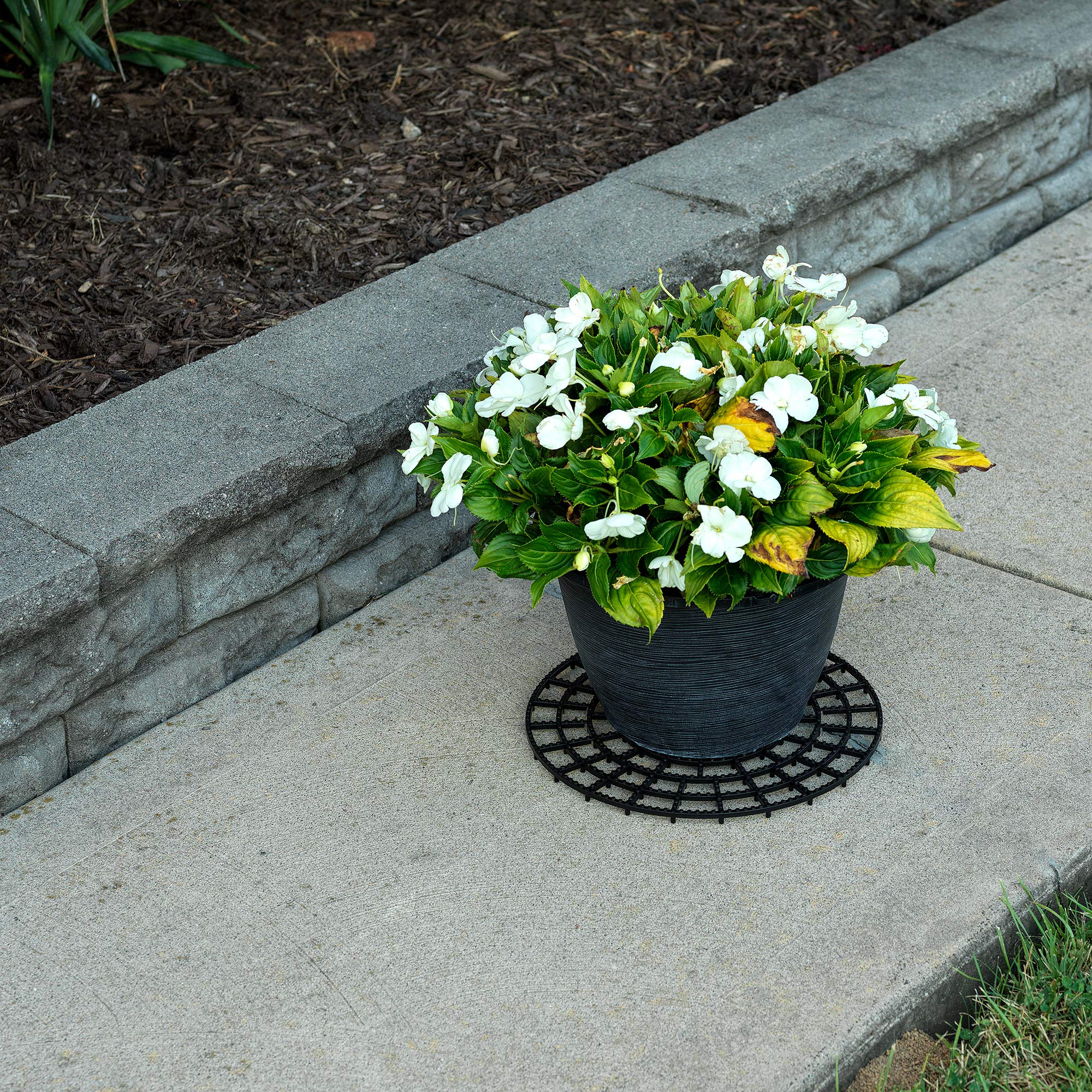 MISTIC COOL 12-inch trivet fits most pots for stable placement outdoors.