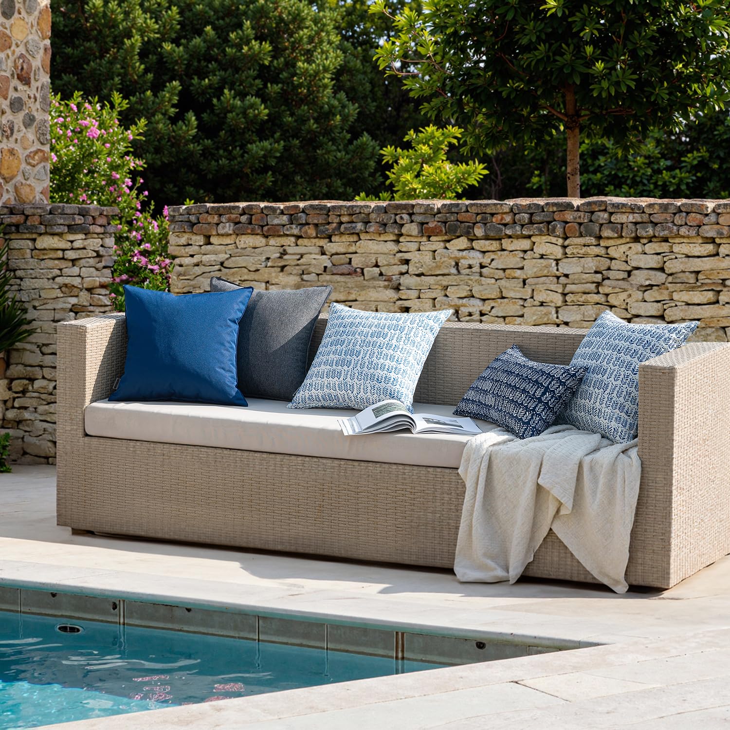 MIULEE outdoor pillows on a patio sofa illustrate versatile decor for rustic to modern spaces.