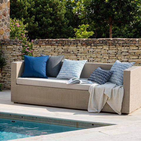 MIULEE outdoor pillows on a patio sofa illustrate versatile decor for rustic to modern spaces.