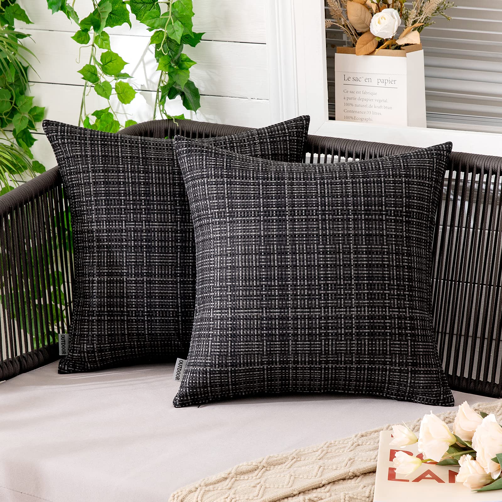 MIULEE outdoor waterproof pillow cover in black 18x18 protecting inserts from splashes.