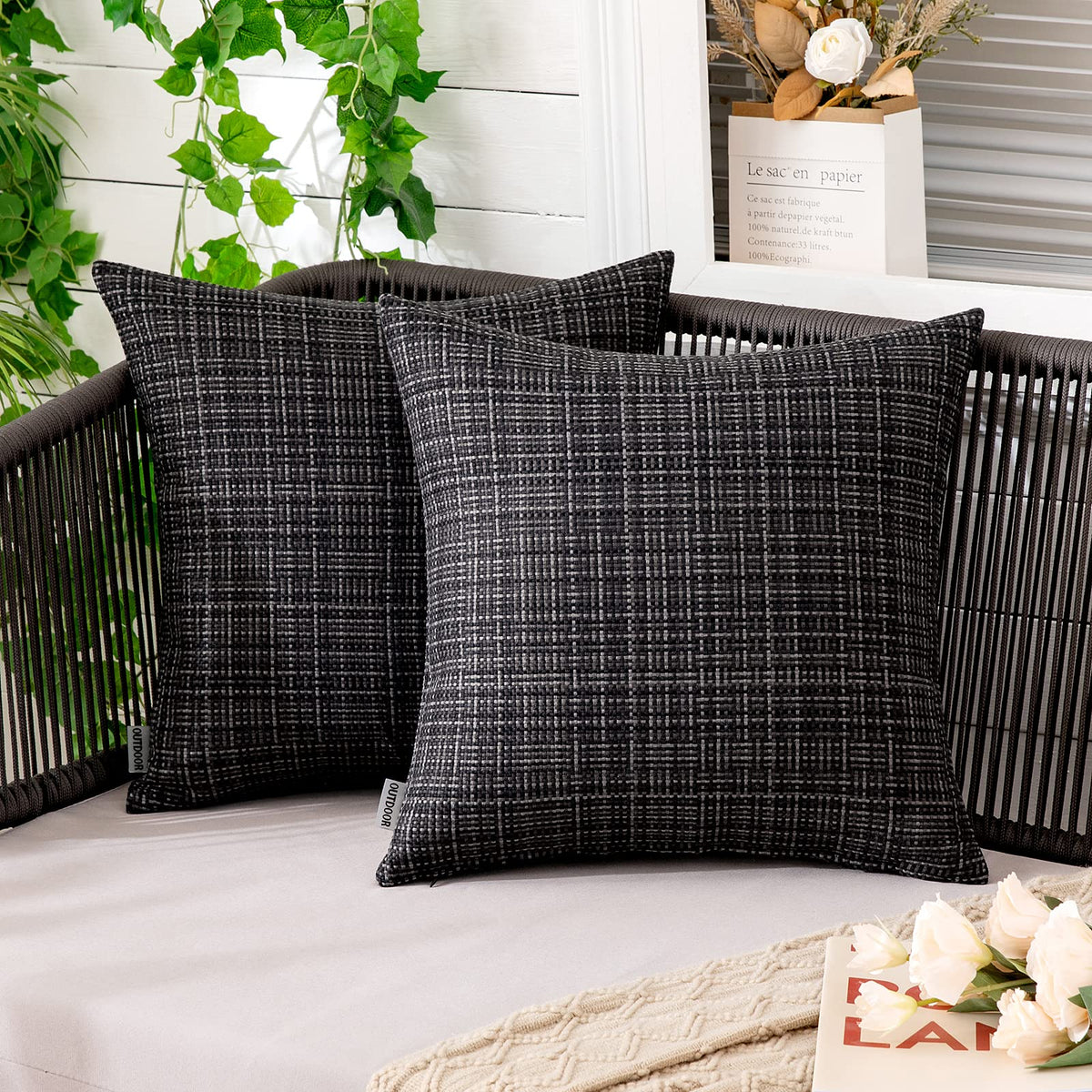 MIULEE outdoor waterproof pillow cover in black 18x18 protecting inserts from splashes.