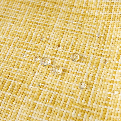 MIULEE yellow pillow cover on patio furniture showing outdoor use and splash protection.