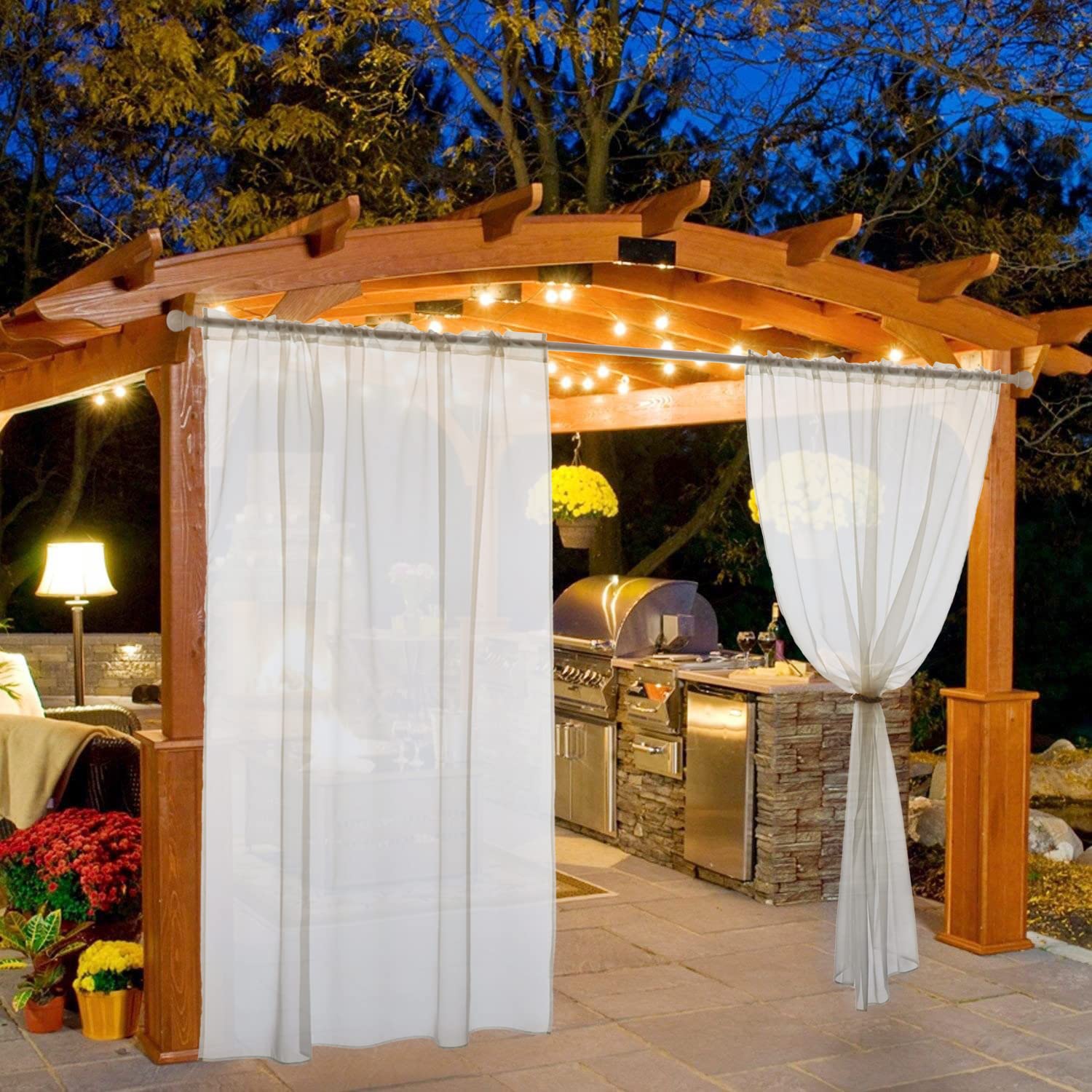 MIULEE voile curtain on a porch demonstrates quick-dry performance after a light shower.
