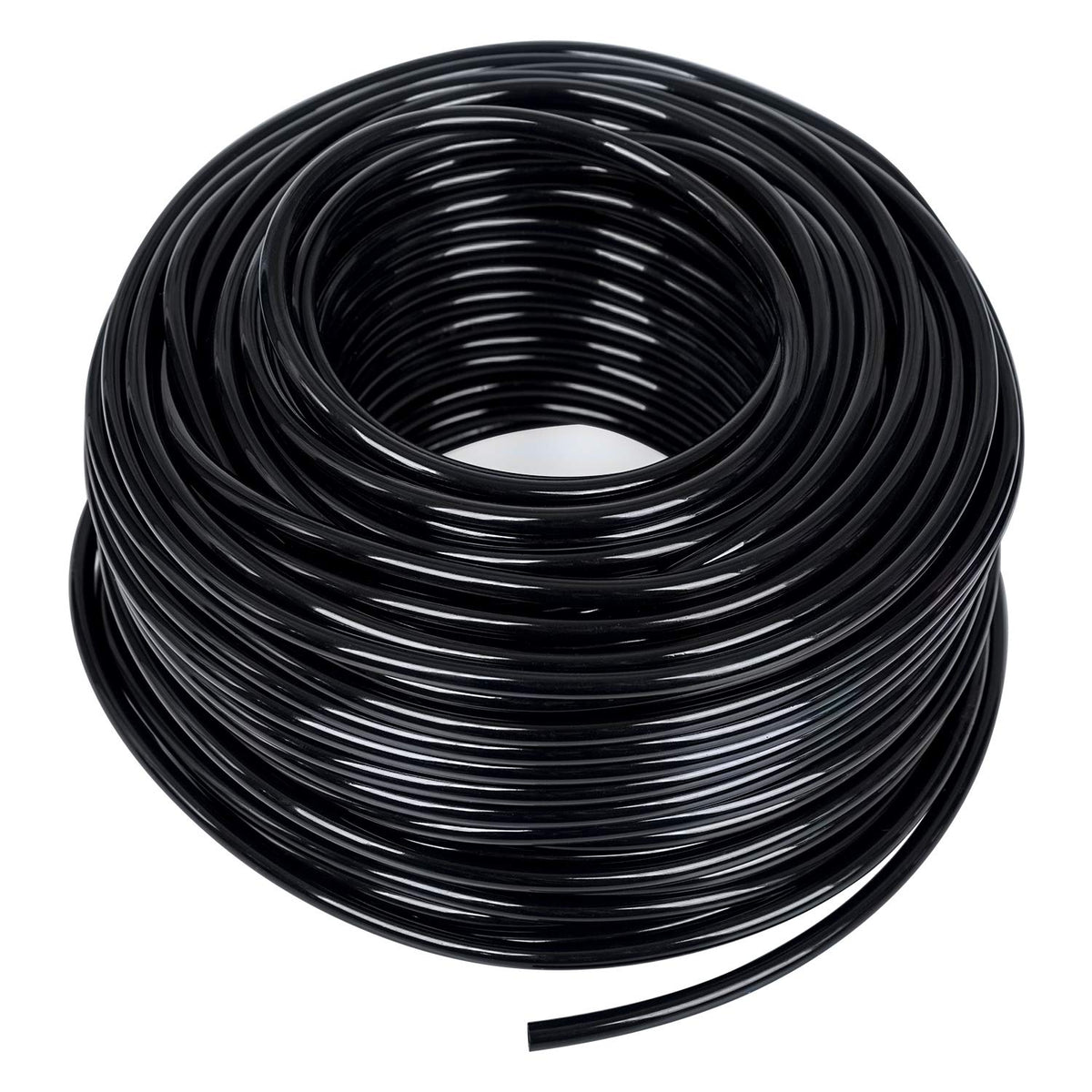 MIXC quarter-inch black distribution tubing for drip irrigation in a garden