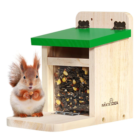 MIXXIDEA squirrel feeder with green cover on outdoor tree keeps feed dry and accessible.