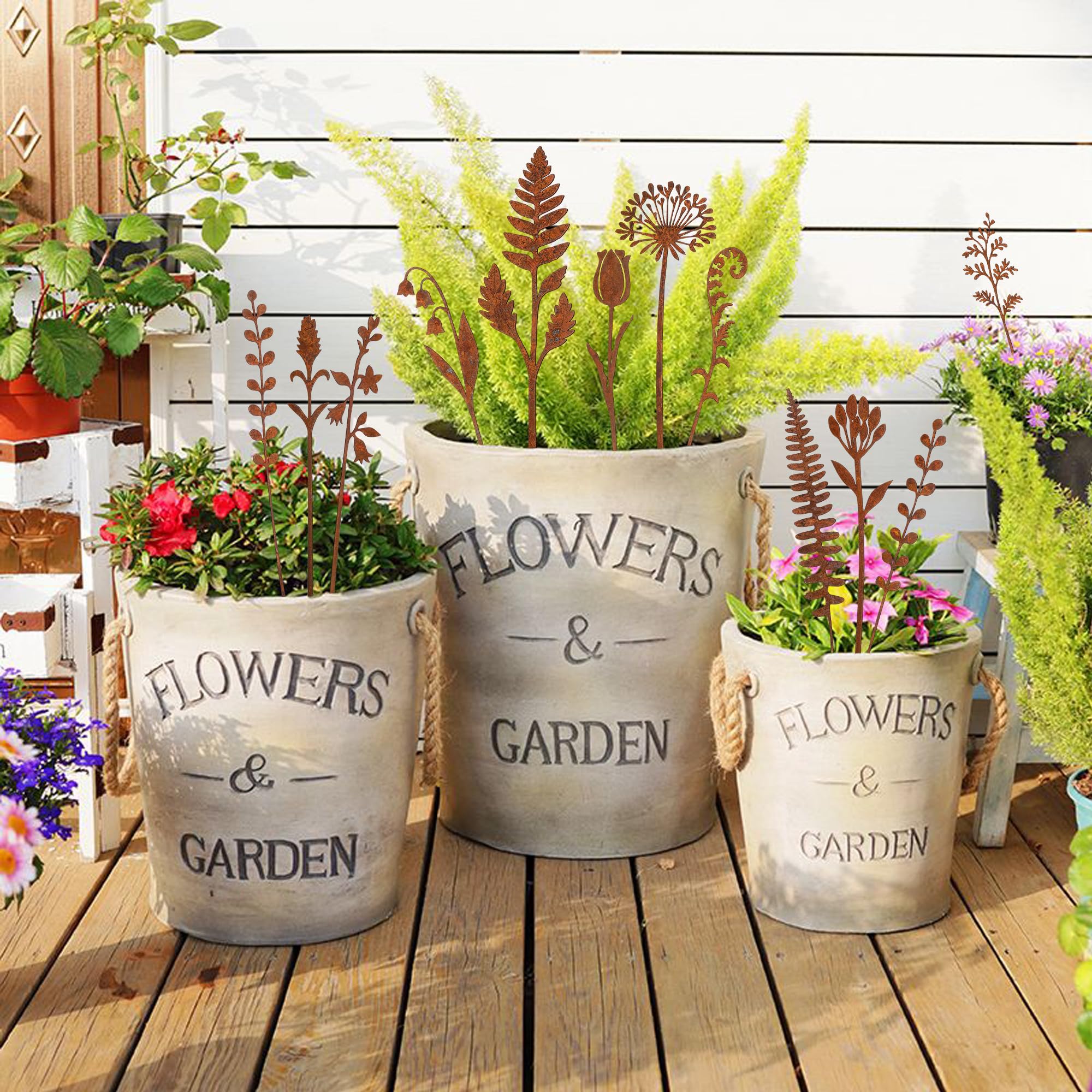 Mizelu iron garden stakes with weathered finish offer durable outdoor accents