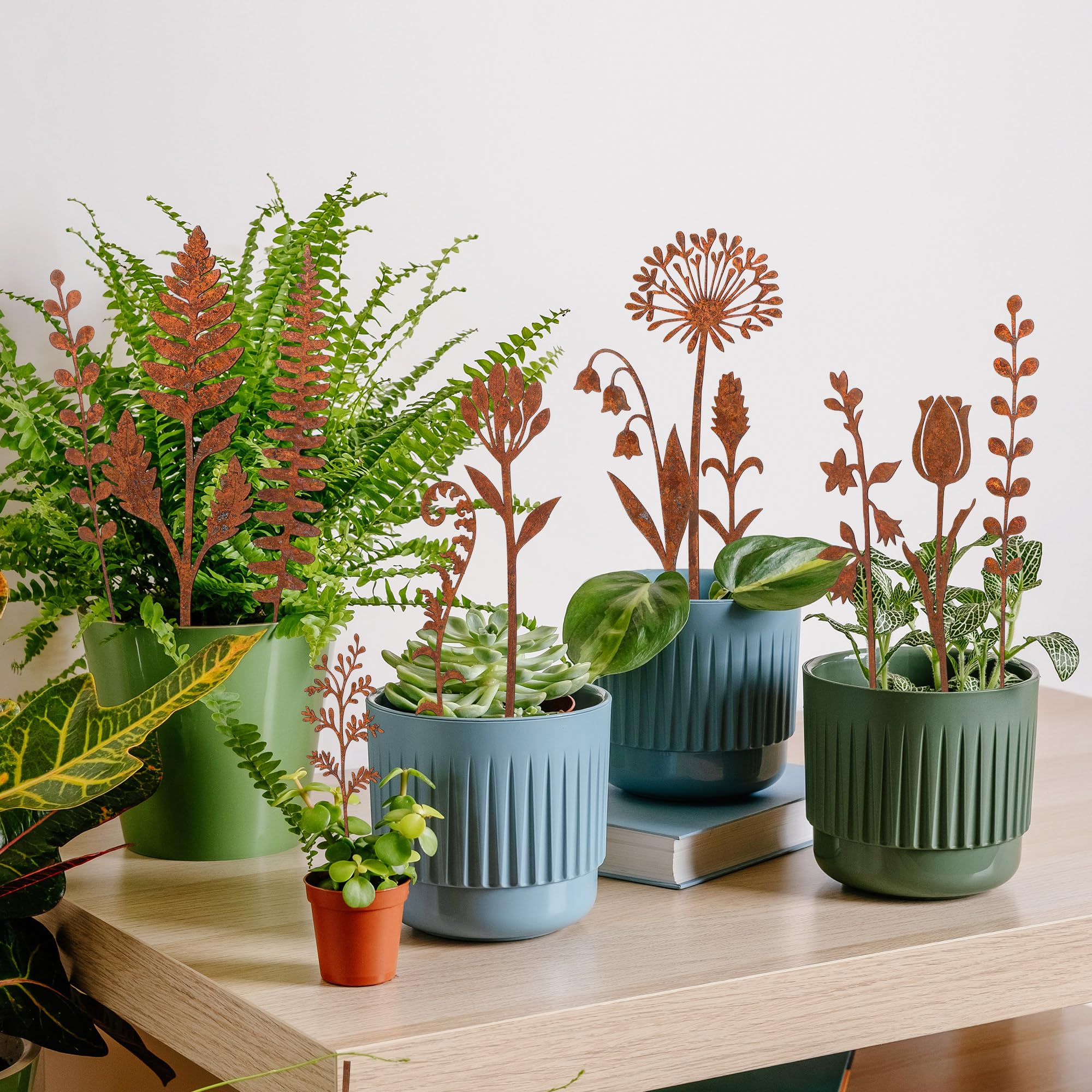 Mizelu rustic garden decor stake collection brings character to planters and borders