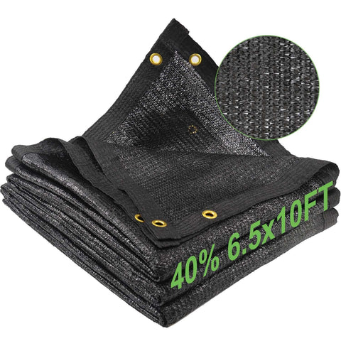 Mklsit shade cloth over a garden setup reduces sun exposure while allowing airflow