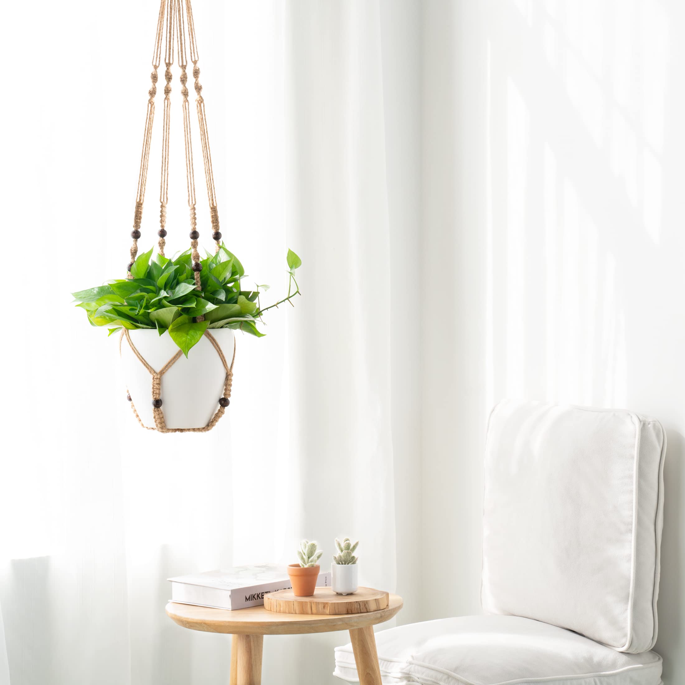 Mkono brown macrame hanger with wood beads enhances boho vibes in any room