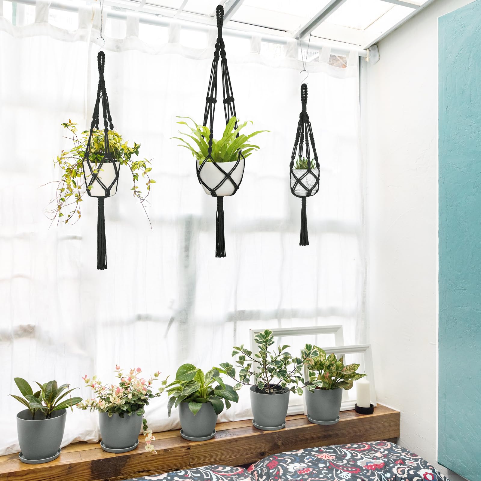 Mkono cotton cord hanging plant stand adds natural texture and easy installation.