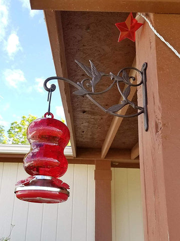 Mkono dark-finish iron hook for versatile outdoor display