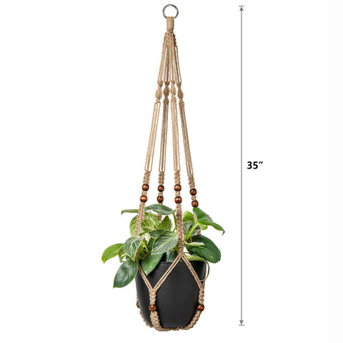 Mkono hanging plant display in living room brings boho ambience.