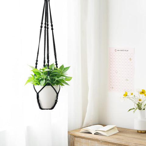 Mkono large hanging plant holder supports up to 12-inch pots on balconies.