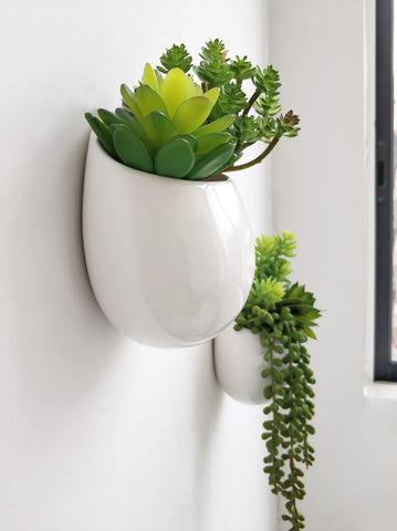 Minimalist white planters by Mkono enhance dorm or balcony spaces