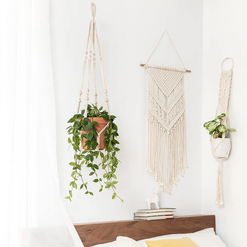 Mkono ivory outdoor-ready macrame planter with wood beads for balconies.