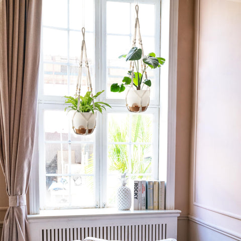 Mkono ivory macrame hanger with four strands adds boho elegance.