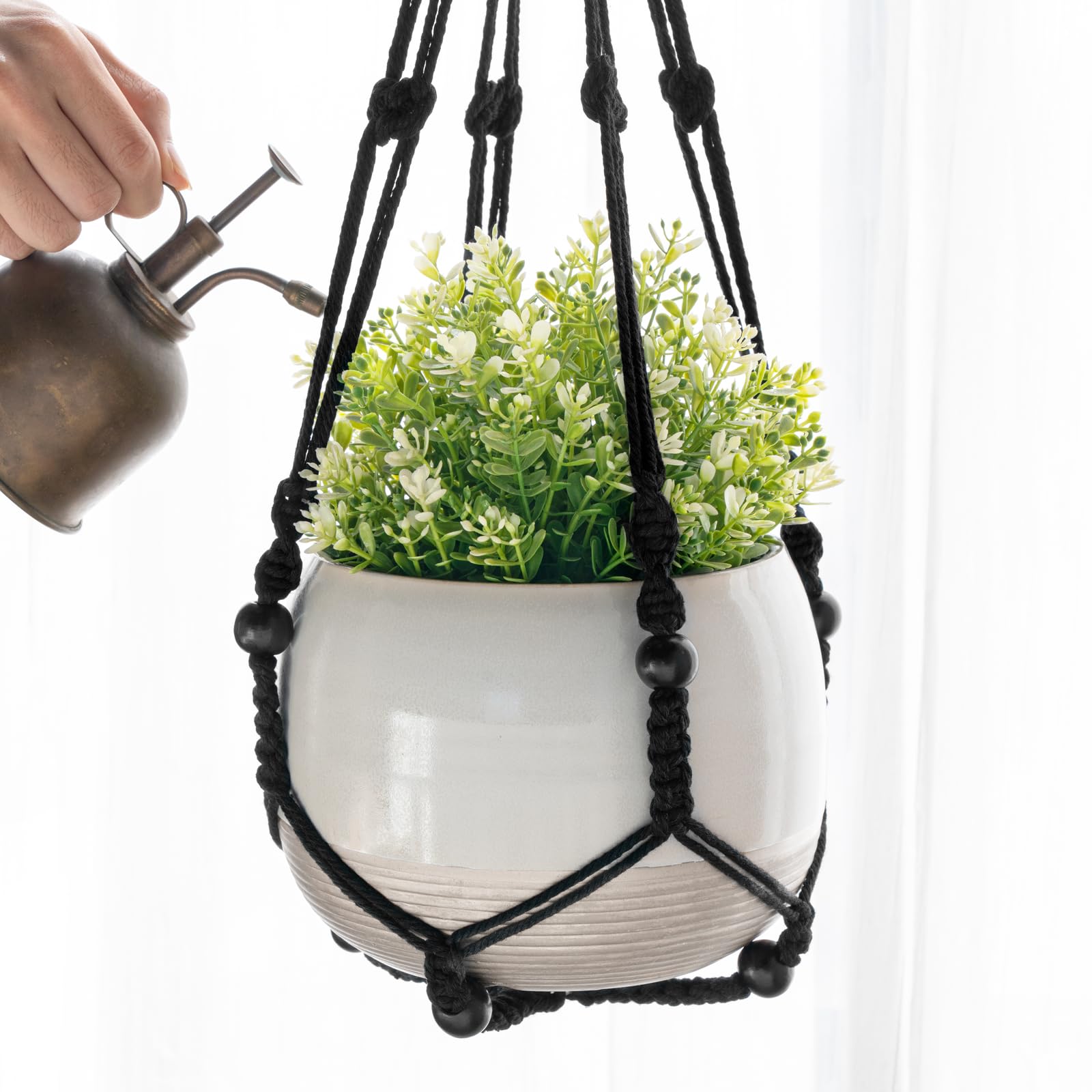Mkono macrame plant hanger close-up showing woven cord detail.