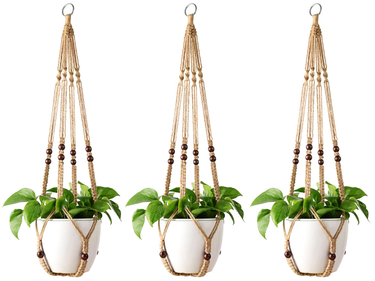 Mkono macrame plant hanger with wood beads enhances rustic decor in any room.