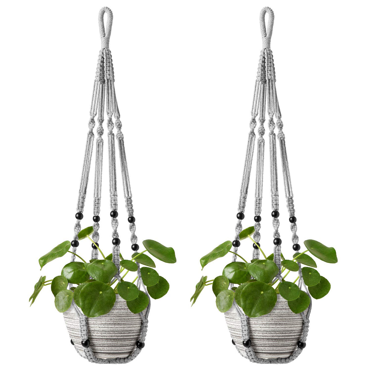 Mkono macrame plant hanger with wood beads adds vintage charm, elevating decor.