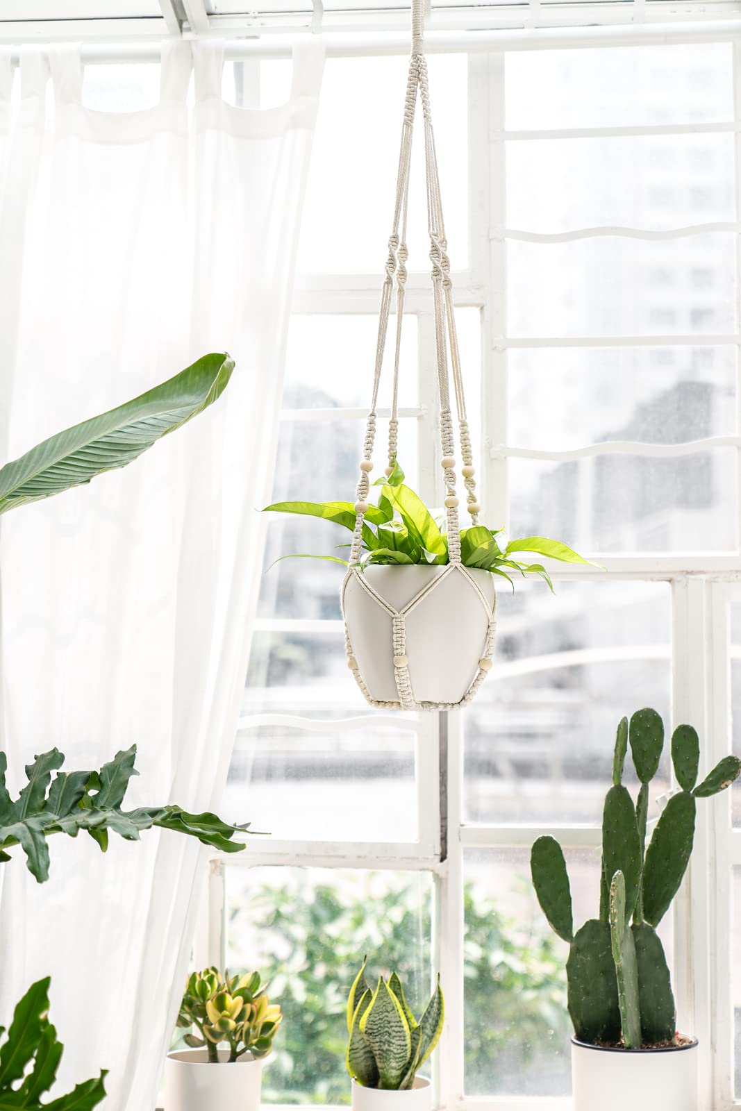 Mkono patio balcony garden ideas using a sturdy ivory hanger.