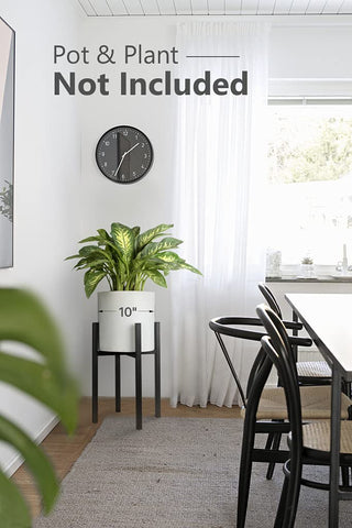 Mkono plant stand in a black metal finish complements modern interiors.