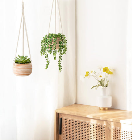Mkono planter with drainage holes suitable for outdoor use.