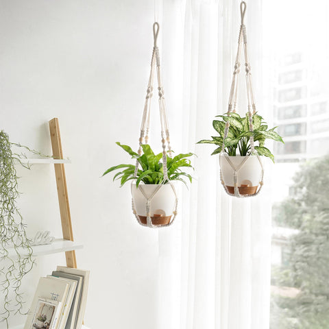 Mkono removable pot and tray with snap buckle for easy cleaning.