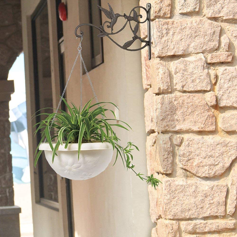 Mkono wind chime and lantern hanger enhances outdoor accents.