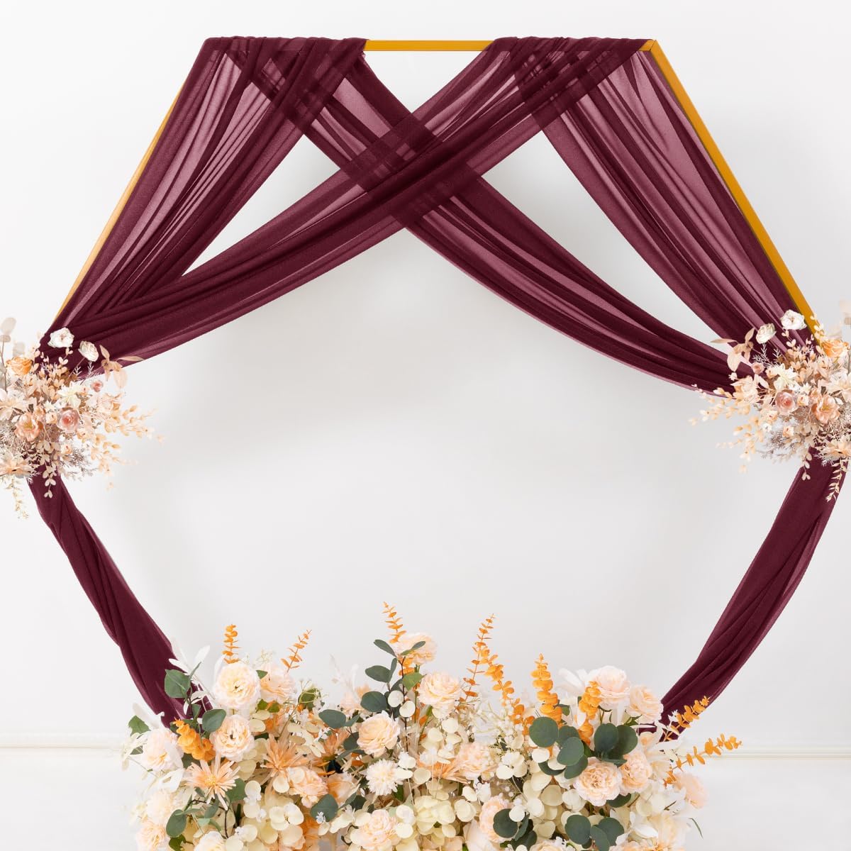 MLMC burgundy drapes styled for a bridal shower photography corner