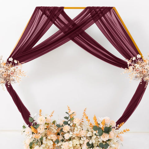 MLMC burgundy drapes styled for a bridal shower photography corner