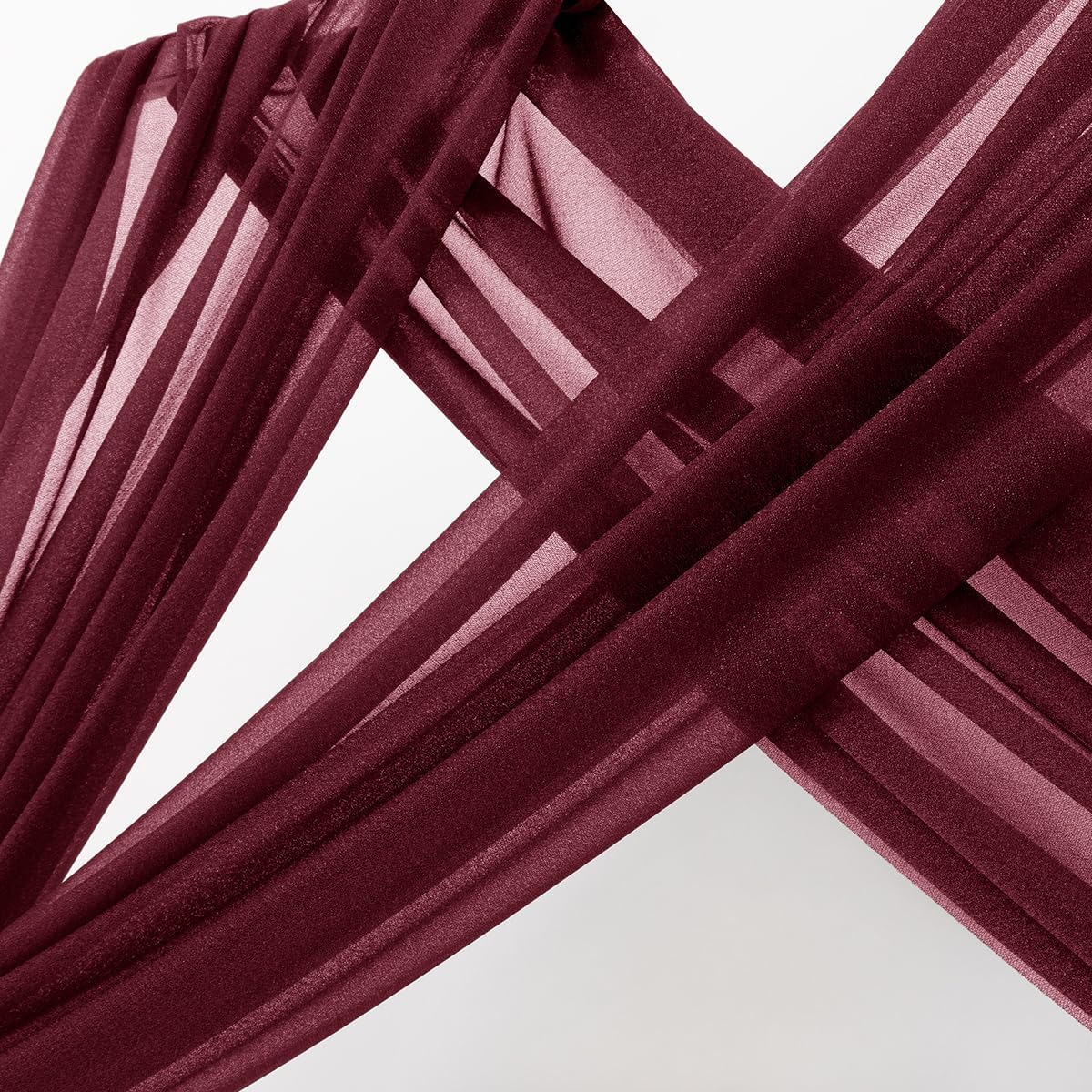 MLMC burgundy drapes flow softly creating a romantic arch effect