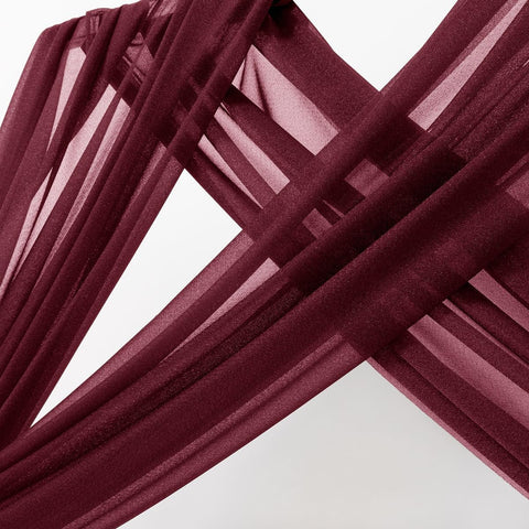 MLMC burgundy drapes flow softly creating a romantic arch effect
