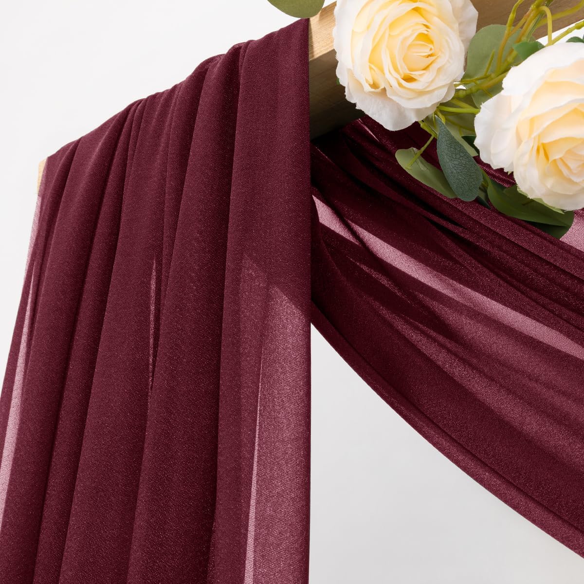 MLMC burgundy sheer backdrop drapes forming an elegant arch