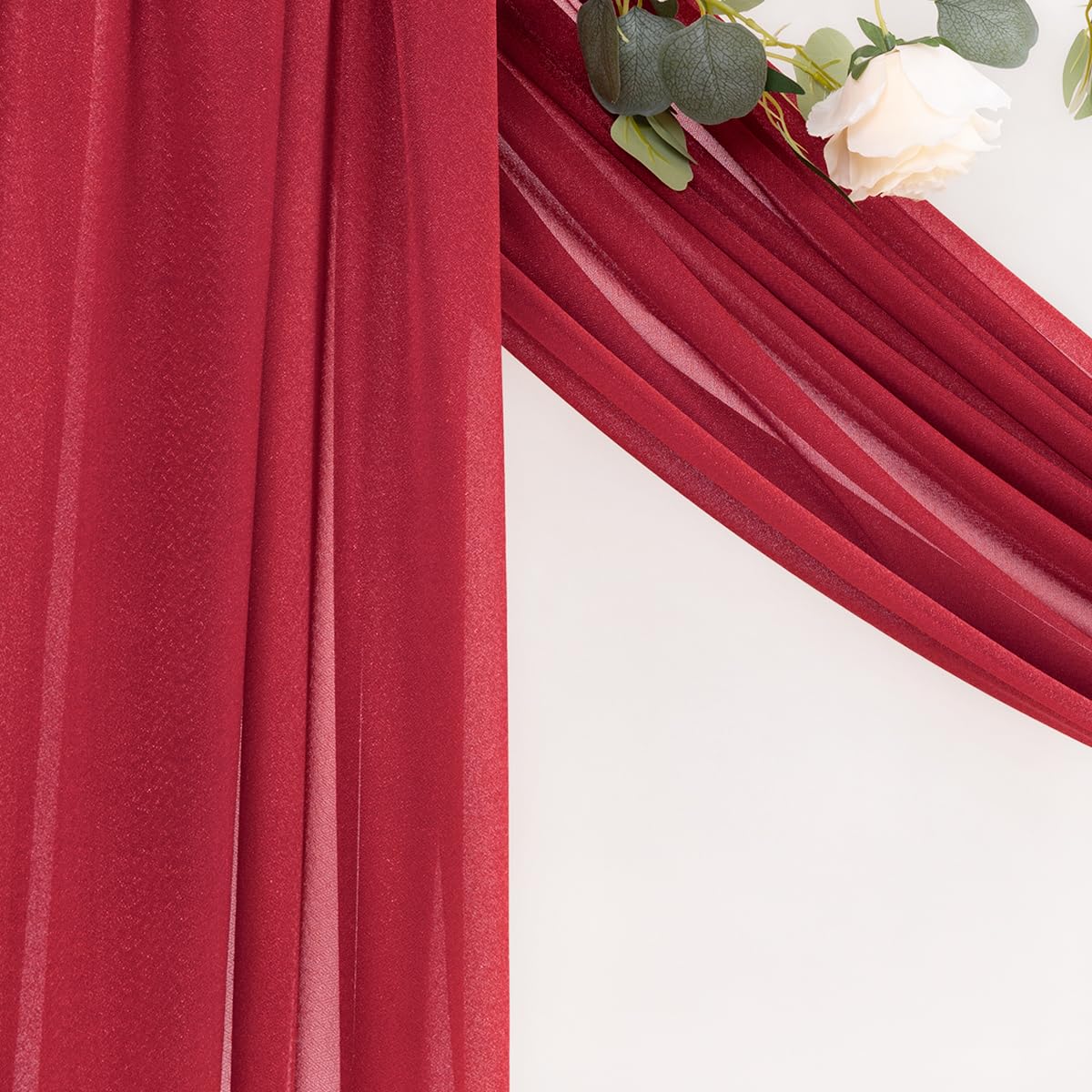 MLMC red wedding arch draping fabric texture detail highlights airy gauze.