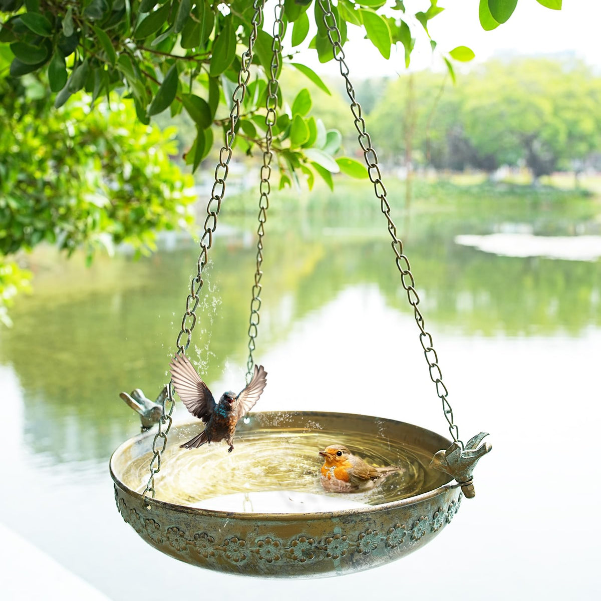 MNRYLKB hanging bird bath with floral pattern invites garden birds.