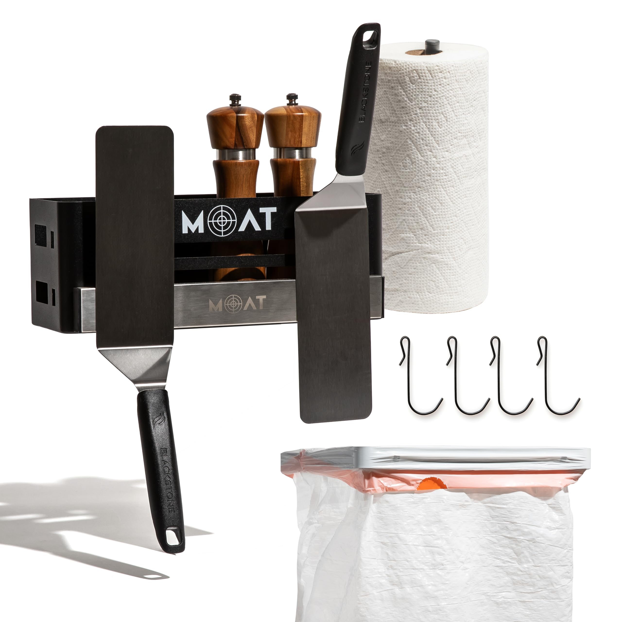 MOAT magnetic grill caddy attached to an outdoor grill for quick tool access.