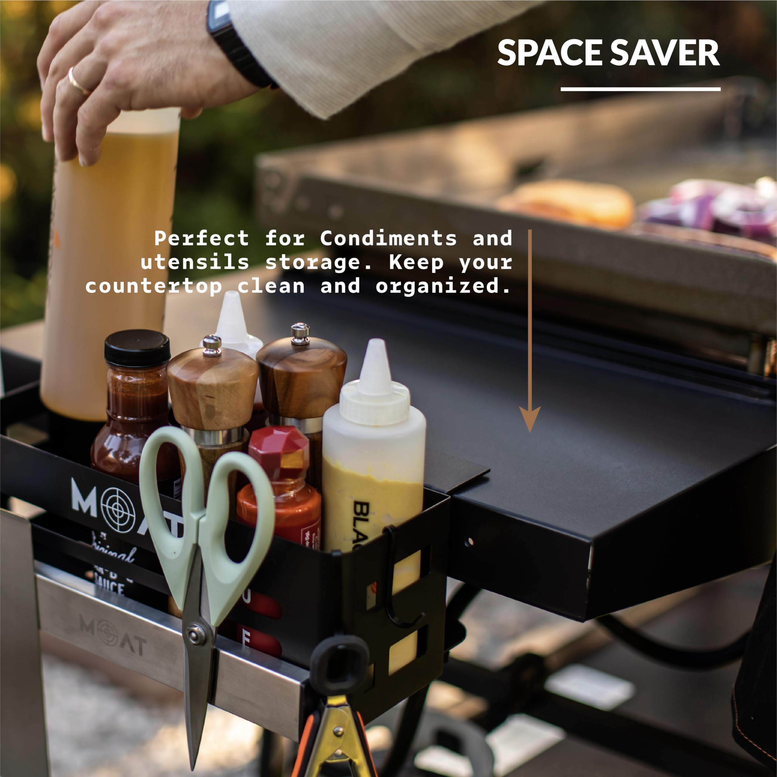 MOAT trash bag holder integrated with grill caddy simplifies cleanup.