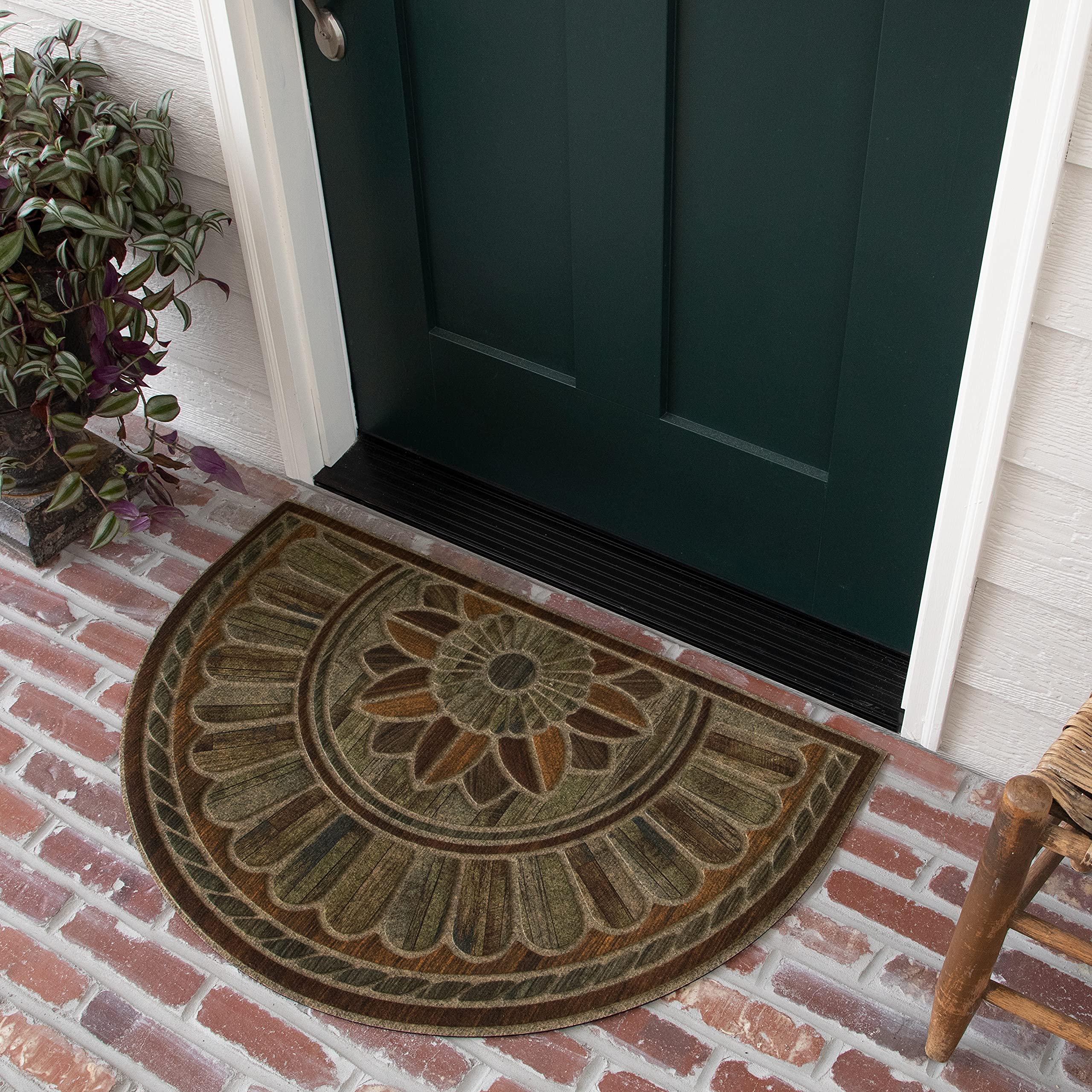 Mohawk Home entryway doormat texture closeup shows durable surface trapping dirt.