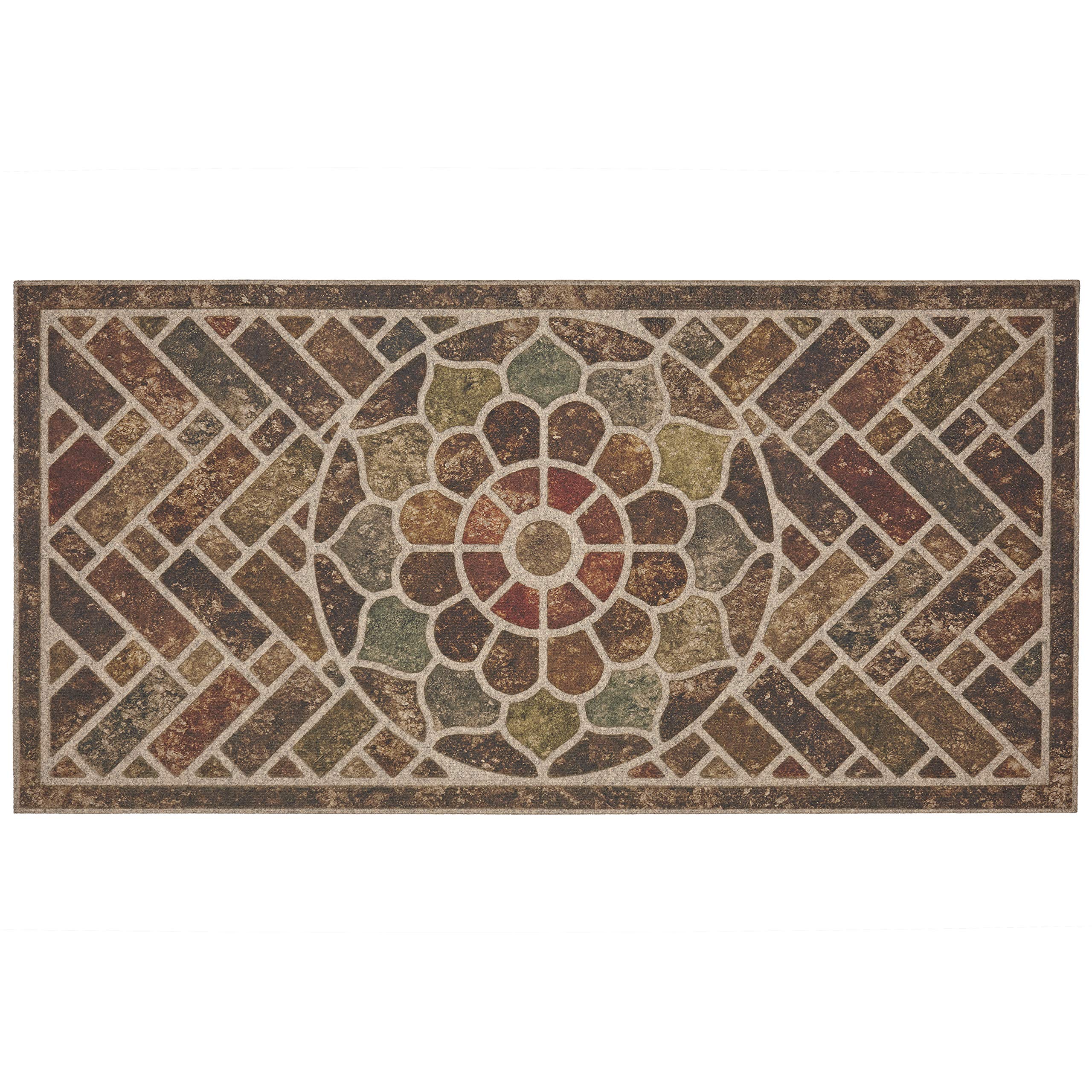 Mohawk Home door mat with grooved surface traps dirt and channels water