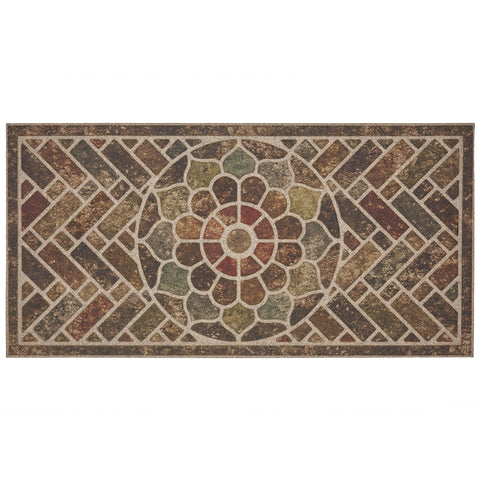 Mohawk Home door mat with grooved surface traps dirt and channels water