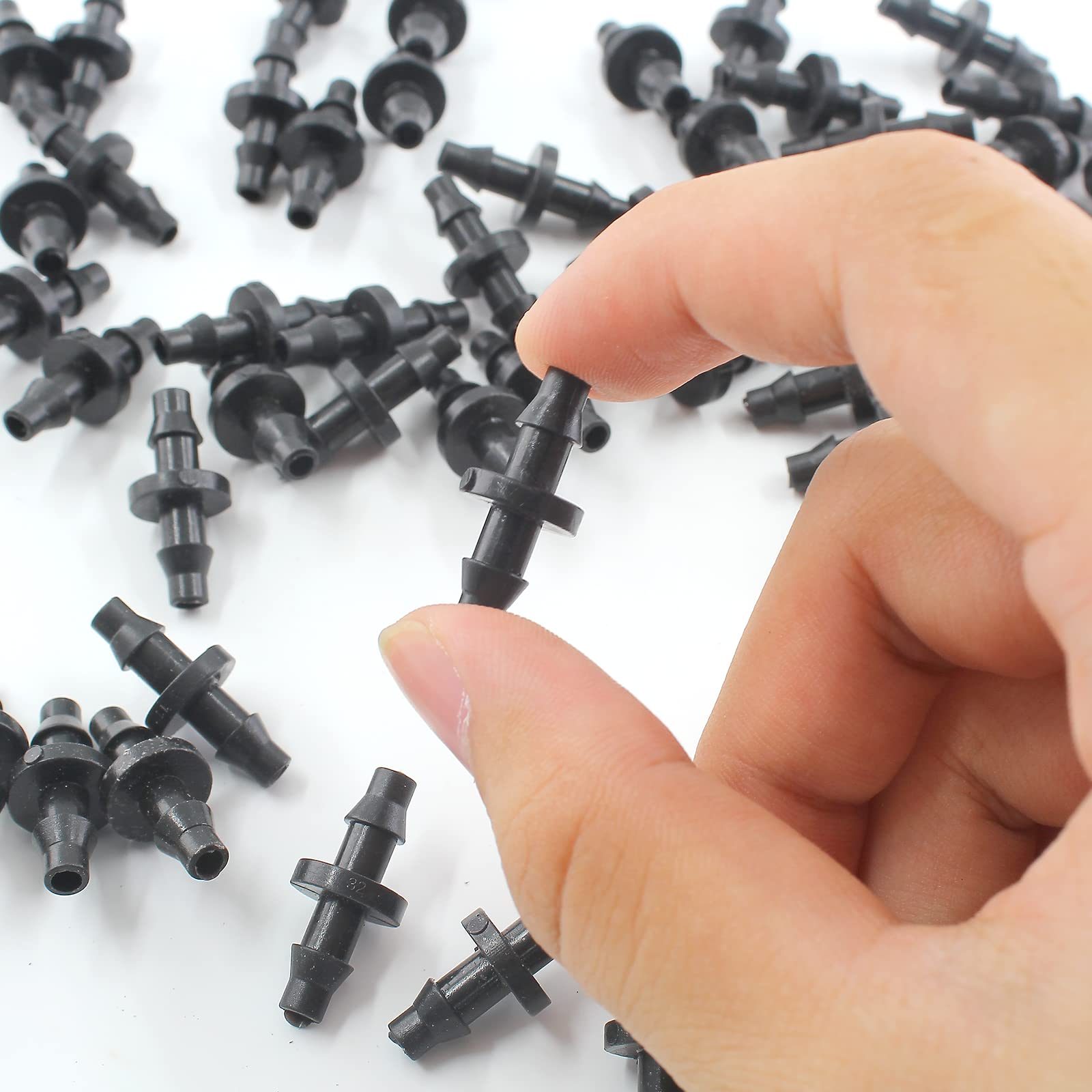 Moicstiy barbed irrigation connector withstands pressure for reliable tubing fit.