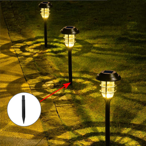 Moicstiy solar stake on driveway creating warm ambience for evenings.