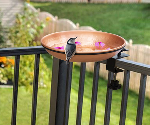 Monarch Abode deck-mounted bird bath secures to railing for outdoor use.