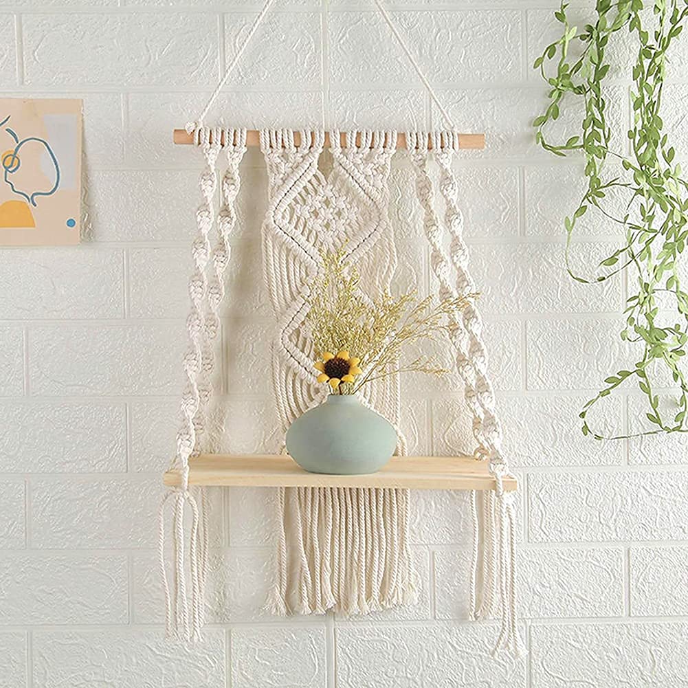 Mong wall hanging shelf with plant pot demonstrates indoor greenery and space-saving storage.