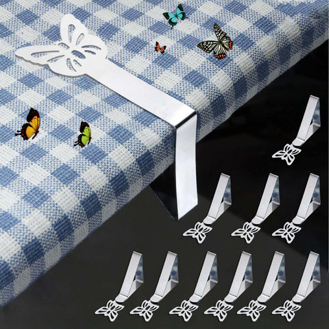 MONNCHA butterfly-tablecloth-clip securing a tablecloth on a windy patio