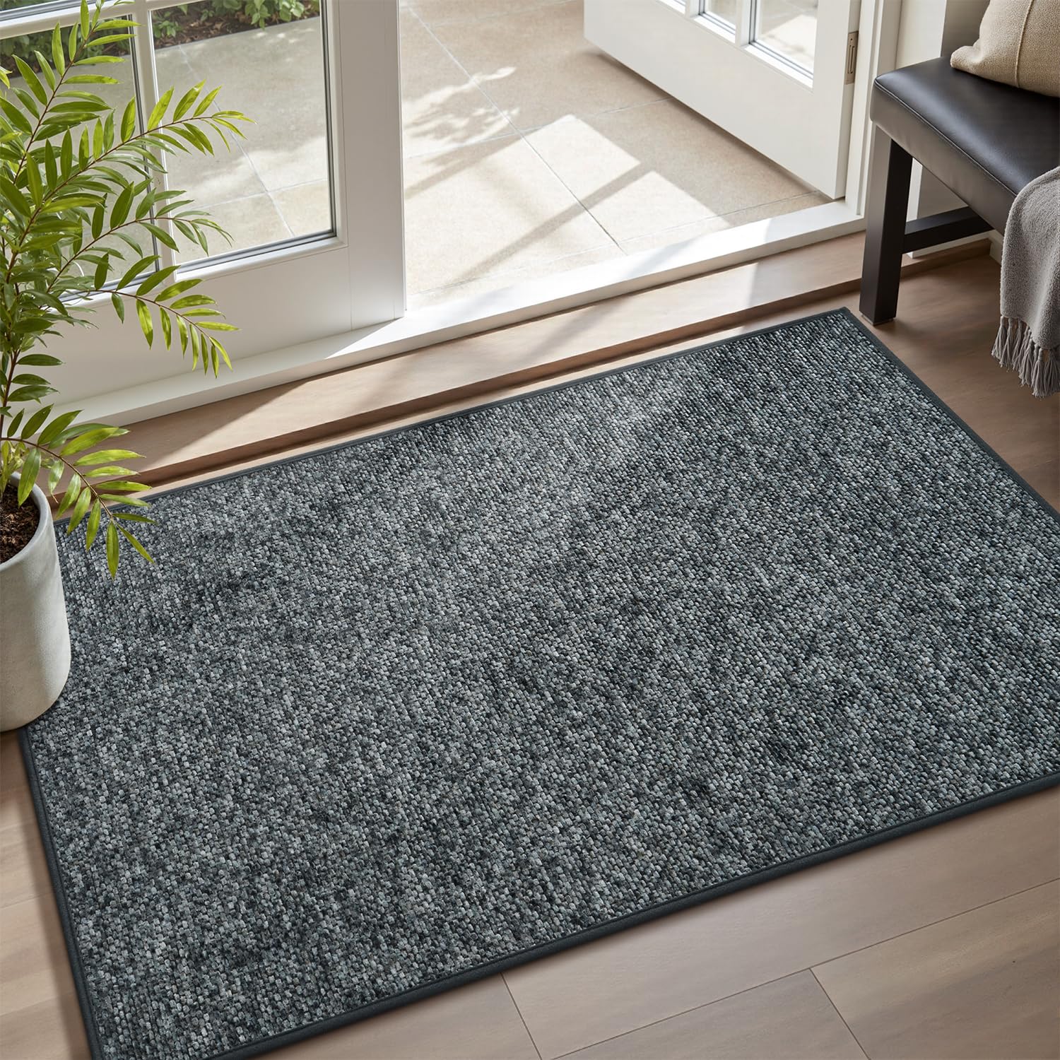 MontVoo door mat with absorbent top layer traps dirt for cleaner entryways.