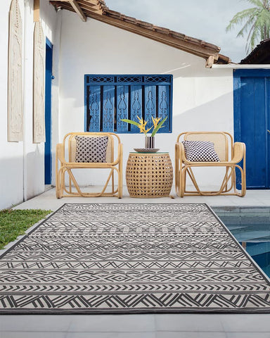 MontVoo flatweave rug laid flat with no creases on a deck