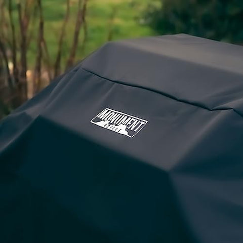 Monument Grills 54-inch cover side view showing sturdy fabric and secure fit