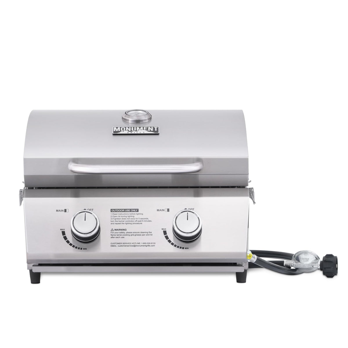 Monument Grills tabletop grill with travel locks for secure transport.
